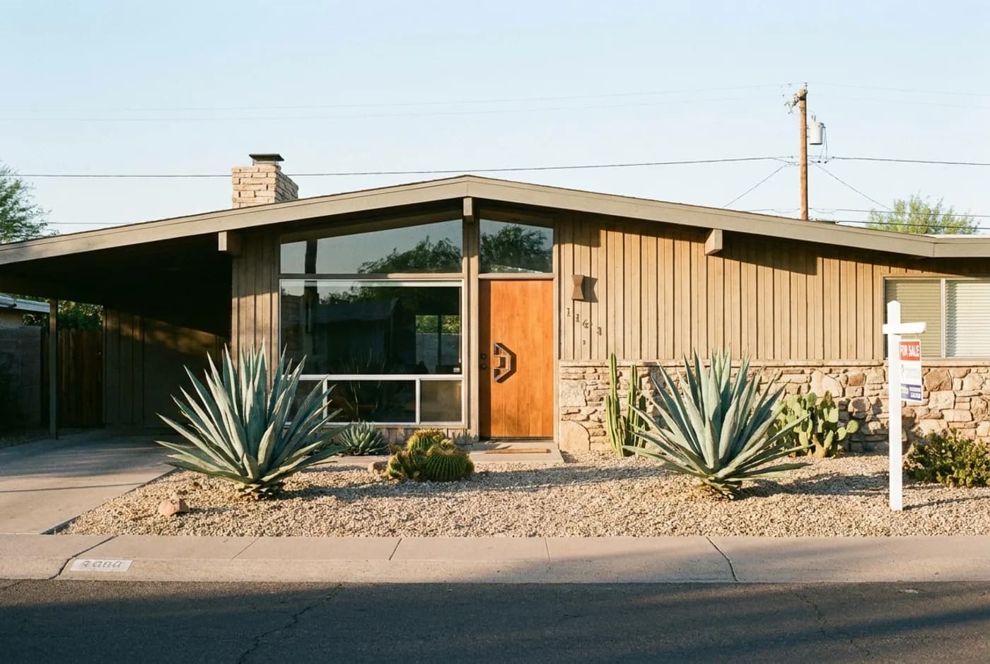 A customer's photograph of a single-storey mid-century ranch house