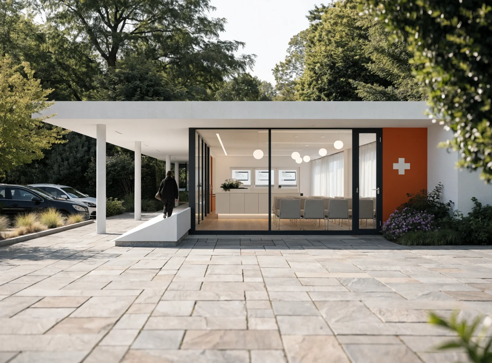A modern single-storey medical clinic with a covered entrance and an access ramp